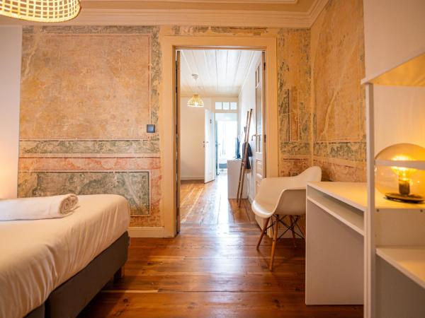 VAGO Alcântara Suites : photo 4 de la chambre chambre triple standard