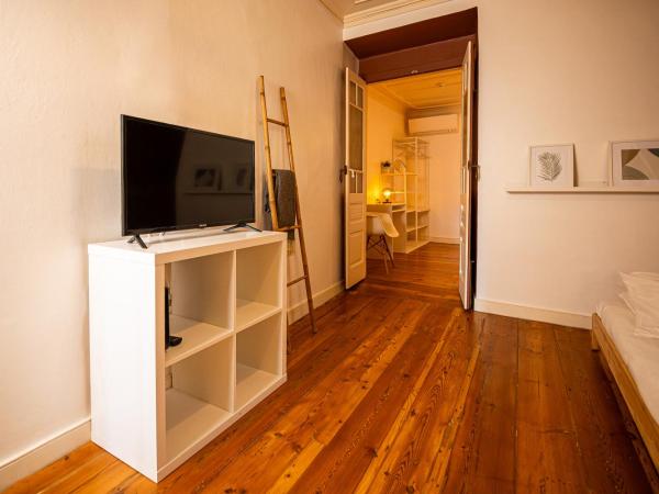 VAGO Alcântara Suites : photo 8 de la chambre chambre triple standard