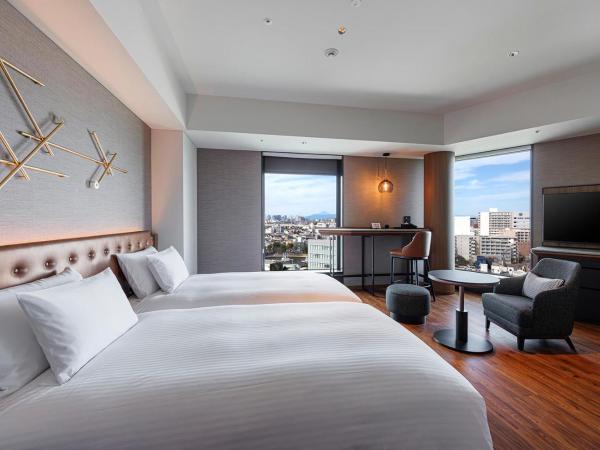 Hotel Metropolitan Tokyo Haneda - 2023-10-17 Grand Opening : photo 1 de la chambre deluxe twin room - river side (1 adult)