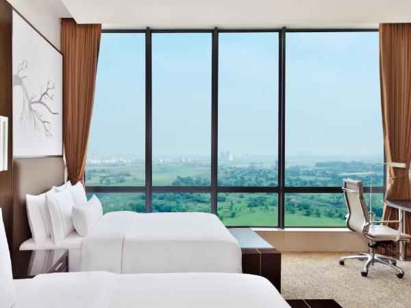 The Westin Kolkata Rajarhat : photo 1 de la chambre club twin room with lounge access (imfl brands and starters during the happy hours from 6:30 pm to 8:30 pm) with 1 way airport transfers
