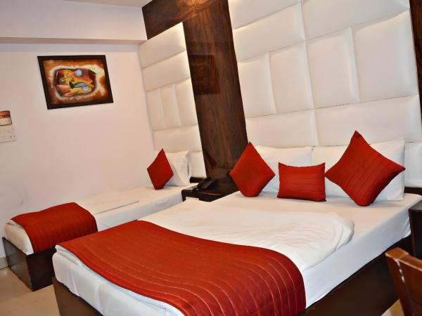 Hotel Sun International : photo 5 de la chambre chambre triple confort