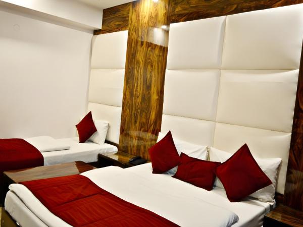 Hotel Sun International : photo 1 de la chambre chambre triple confort