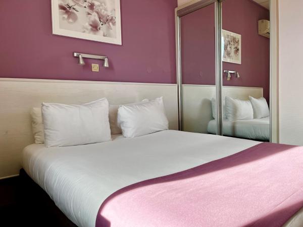 CitHôtel Le Louvre : photo 1 de la chambre chambre double Économique