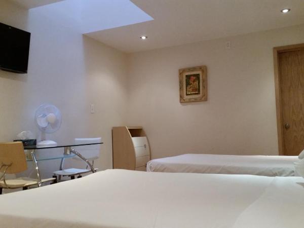 Dragon Gate Inn : photo 3 de la chambre chambre familiale supérieure avec 4 lits