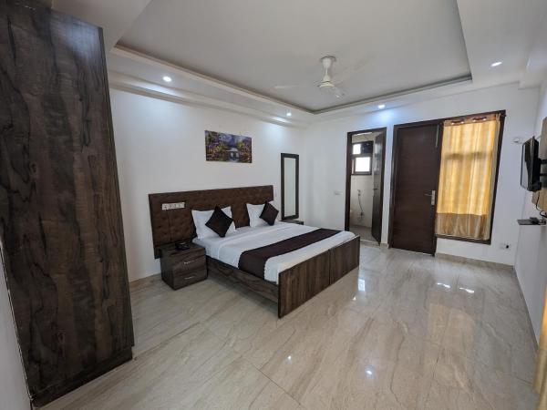 Flotel Residency Nearby Qutub Minar : photo 9 de la chambre chambre double deluxe (2 adultes + 1 enfant)