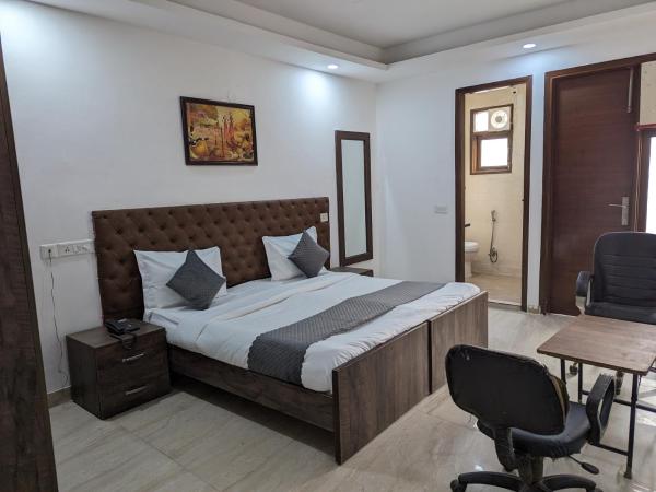 Flotel Residency Nearby Qutub Minar : photo 8 de la chambre chambre double deluxe (2 adultes + 1 enfant)