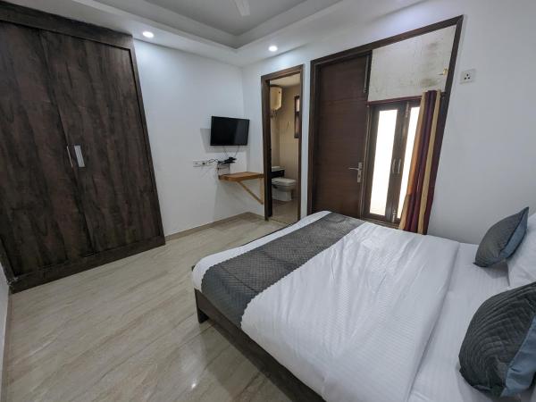 Flotel Residency Nearby Qutub Minar : photo 7 de la chambre chambre double deluxe (2 adultes + 1 enfant)