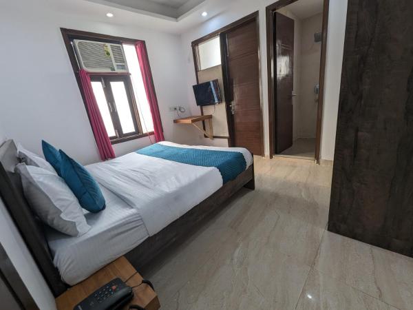 Flotel Residency Nearby Qutub Minar : photo 3 de la chambre chambre double deluxe (2 adultes + 1 enfant)