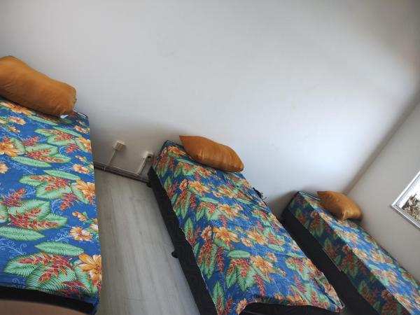 Pousada Family : photo 1 de la chambre chambre triple
