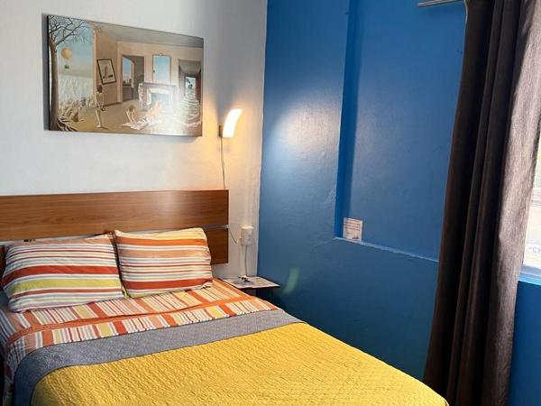 Estancia María Bonita Morelia : photo 3 de la chambre chambre deluxe (2 adultes + 1 enfant)