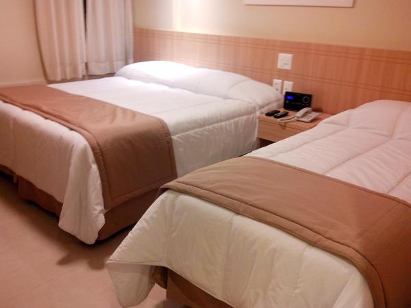 Elegance Praia Hotel : photo 3 de la chambre chambre triple