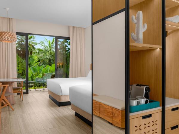 Hilton Tulum Riviera Maya All-Inclusive Resort : photo 9 de la chambre enclave queen room with two queen beds and nature view