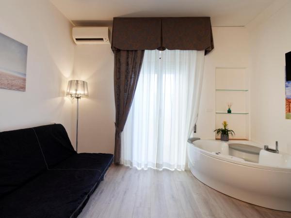 Hotel Estate : photo 5 de la chambre suite avec baignoire spa