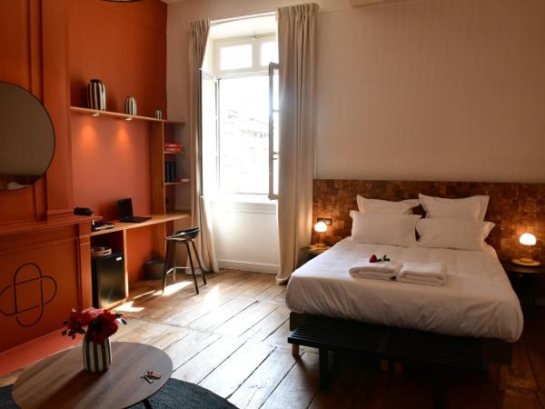 Les Chambres du Cloître : photo 2 de la chambre chambre lit queen-size deluxe