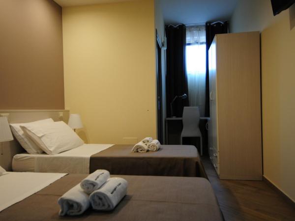 B&B President's Home : photo 10 de la chambre chambre double ou lits jumeaux avec lit d'appoint