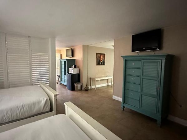 Tahitian Inn Boutique Hotel Tampa : photo 2 de la chambre suite lit queen-size