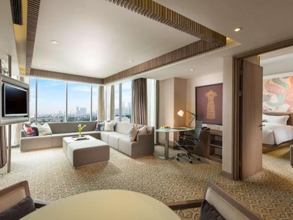 DoubleTree by Hilton Jakarta - Diponegoro : photo 1 de la chambre suite supérieure lit king-size