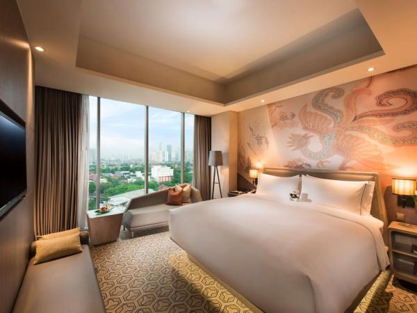 DoubleTree by Hilton Jakarta - Diponegoro : photo 1 de la chambre suite 1 chambre lit king-size - accès au salon
