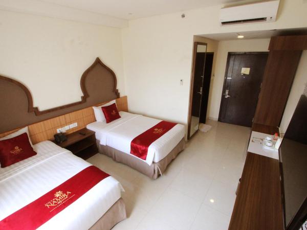 Namira Syariah Hotel Surabaya : photo 2 de la chambre chambre double ou lits jumeaux supérieure avec vue sur ville