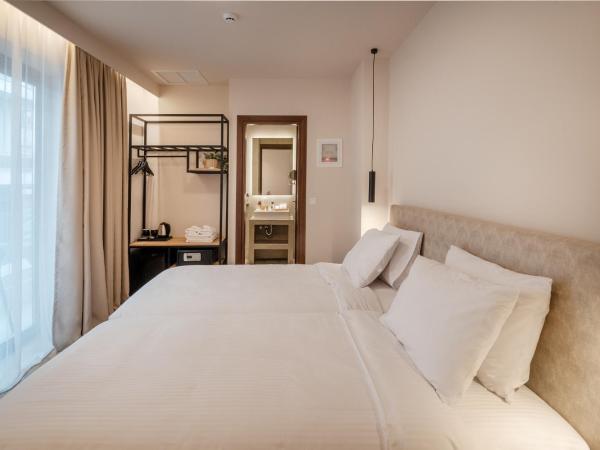 IRA - ΗΡΑ Hotel : photo 1 de la chambre chambre double ou lits jumeaux supérieure avec vue sur ville