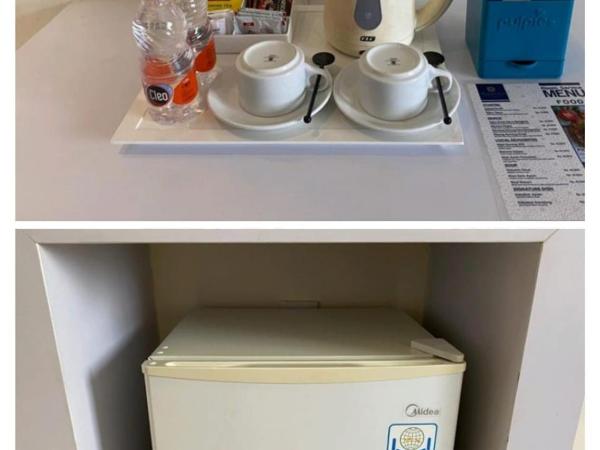 Namira Syariah Hotel Surabaya : photo 1 de la chambre chambre double ou lits jumeaux deluxe - vue sur ville 