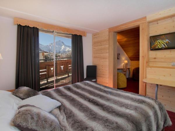 Hotel Adret : photo 1 de la chambre chambre familiale avec balcon (2 adultes + 2 enfants)
