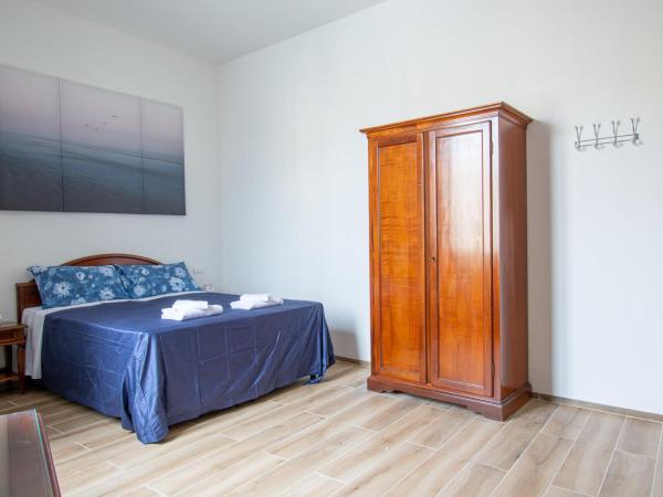 Guest House Paraiso : photo 3 de la chambre chambre triple avec salle de bains privative séparée