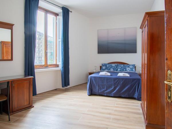 Guest House Paraiso : photo 8 de la chambre chambre triple avec salle de bains privative séparée