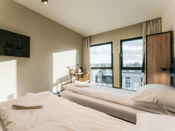 MEININGER Kraków Centrum : photo 2 de la chambre chambre triple