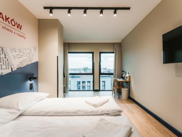 MEININGER Kraków Centrum : photo 1 de la chambre chambre simple