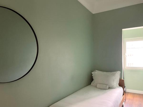 Avenue Hostel & Suites : photo 4 de la chambre chambre simple avec salle de bains commune