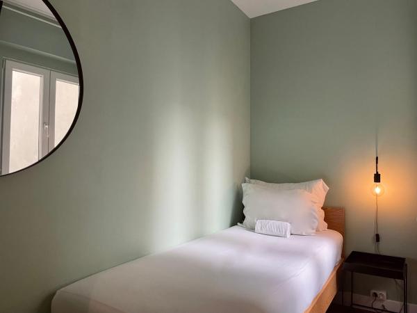 Avenue Hostel & Suites : photo 5 de la chambre chambre simple avec salle de bains commune