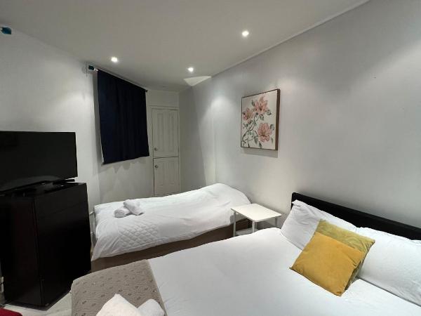 Fulham suites : photo 4 de la chambre chambre triple avec salle de bains commune