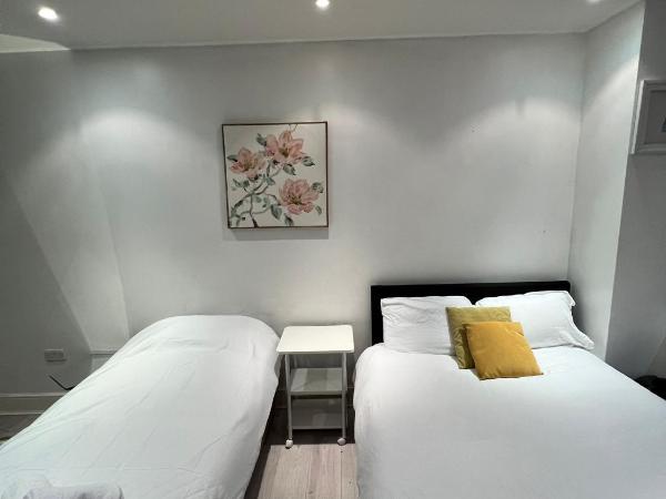 Fulham suites : photo 6 de la chambre chambre triple avec salle de bains commune