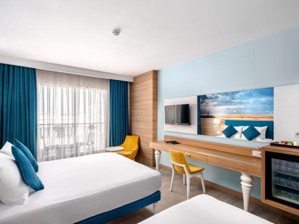 SUN HEAVEN FAMILY & SPA : photo 1 de la chambre chambre double ou lits jumeaux standard avec balcon