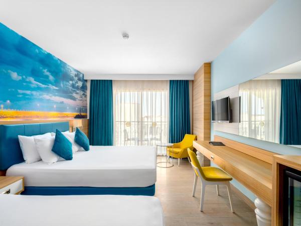 SUN HEAVEN FAMILY & SPA : photo 7 de la chambre chambre double ou lits jumeaux standard avec balcon