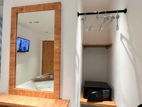 Apple 1 Hotel Gurney : photo 7 de la chambre chambre lit queen-size deluxe