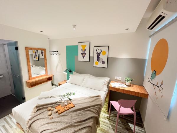 Apple 1 Hotel Gurney : photo 3 de la chambre chambre lit queen-size deluxe