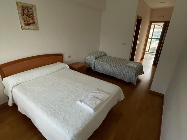 Casa Diocesana VIA LUCIS : photo 2 de la chambre chambre triple