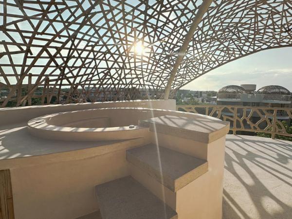 Kan Hotel Tulum & Beach Clubs : photo 1 de la chambre chambre lit king-size avec baignoire spa