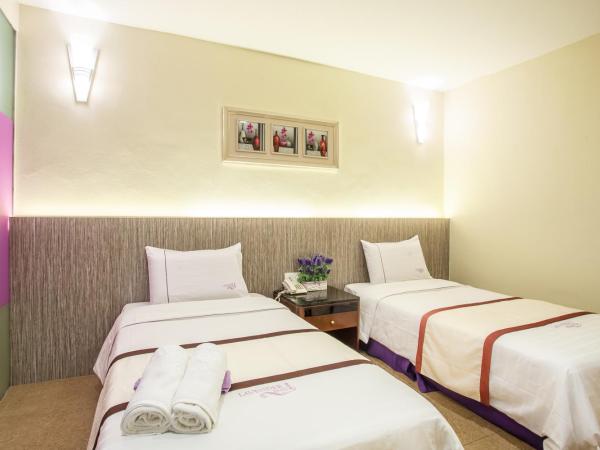 Lavender Inn Nusa Bestari : photo 1 de la chambre chambre lits jumeaux supérieure
