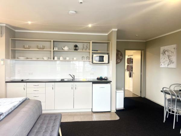 Ashbrook Motel Taupo : photo 7 de la chambre suite premier 1 chambre avec baignoire spa