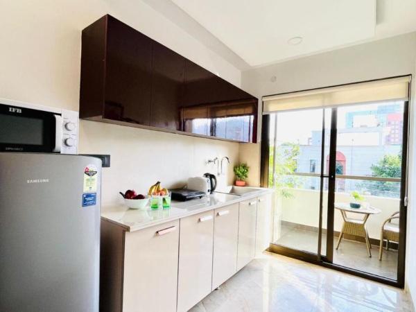 BluO Studio3 DLF Cybercity - Balcony, Gym TT, Lift : photo 6 de la chambre studio avec balcon 