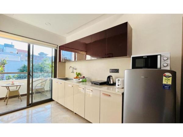 BluO Studio3 DLF Cybercity - Balcony, Gym TT, Lift : photo 1 de la chambre studio avec balcon 