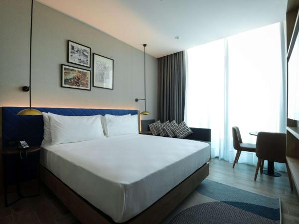 Hilton Garden Inn Ankara Cankaya : photo 1 de la chambre chambre lit king-size avec canapé-lit