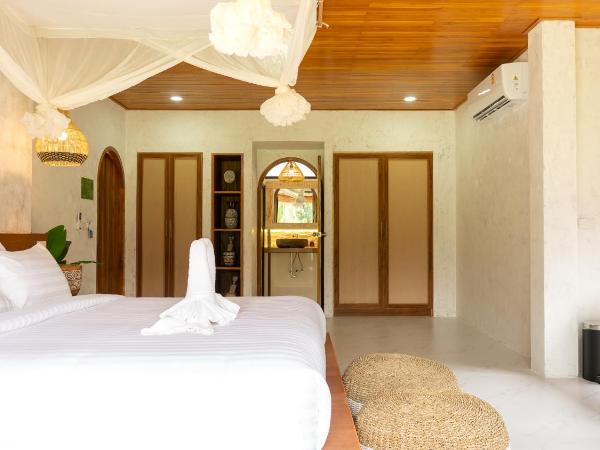 Long Beach Chalet - SHA Extra Plus : photo 3 de la chambre chambre pavillon lagon avec baignoire spa