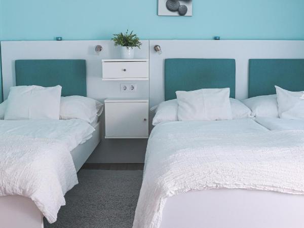 Szivárvány Panzió : photo 9 de la chambre chambre triple