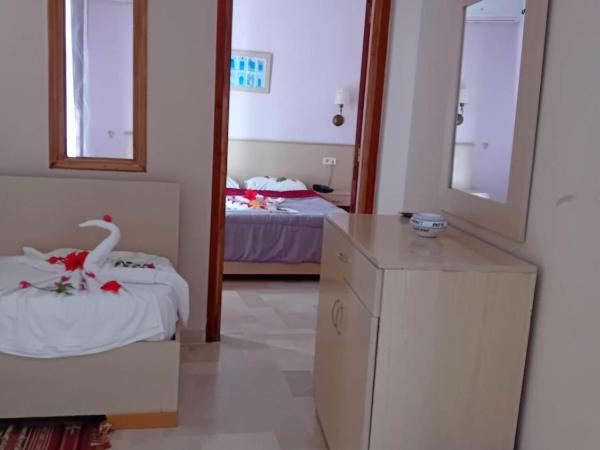 Hôtel Romane : photo 1 de la chambre chambre quadruple