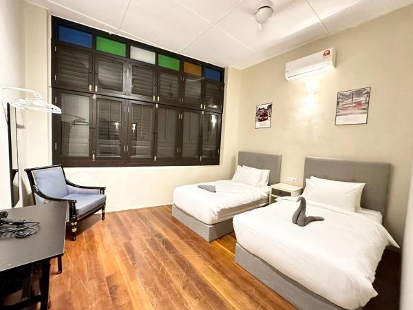 Madras Inn 58-1 : photo 7 de la chambre chambre lits jumeaux standard avec salle de bains commune