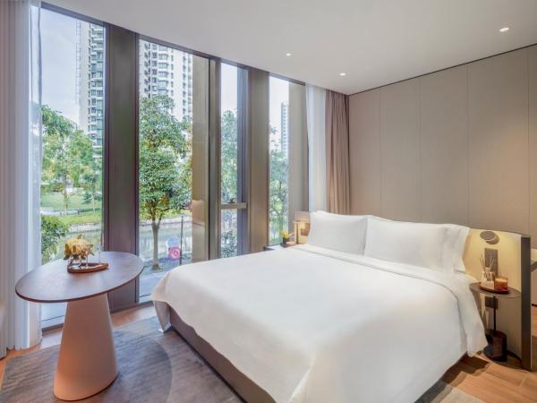 Fraser Residence River Promenade, Singapore : photo 1 de la chambre studio premier avec accès au salon